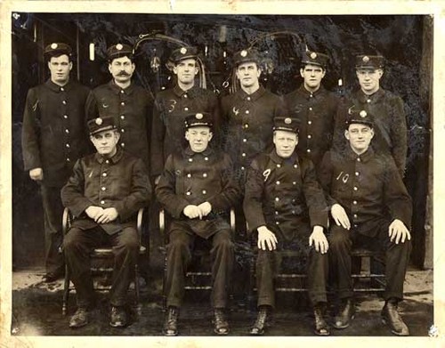 [Group photo of Firemen at Old Engine 12]