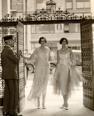 [Two women standing in the entrance of the Women's Building]