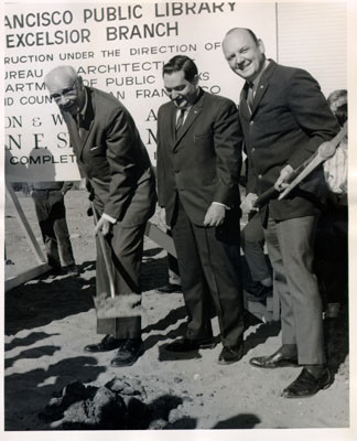 [Mayor Shelley, George Vetari and M. Walter G. Jebe standing on the proposed site of the Excelsior Library