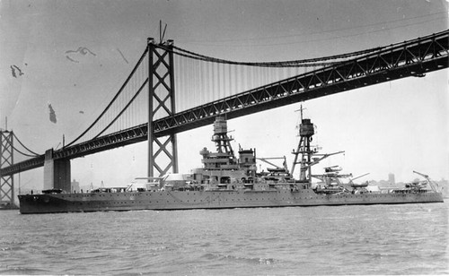 [Battleship U.S.S. Texas passes under Bay Bridge]