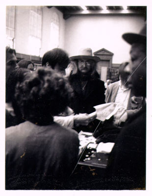 [Author Richard Brautigan and a group of people in the Literature Department at the Main Library]