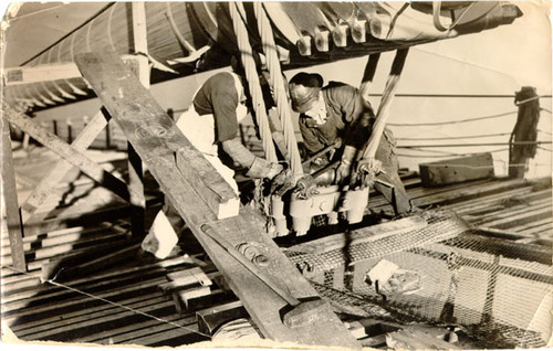 [Construction workers on the Golden Gate Bridge]