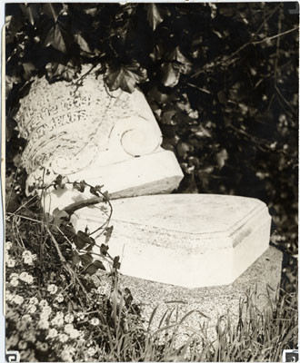 [Overturned gravestones at Laurel Hill Cemetery]