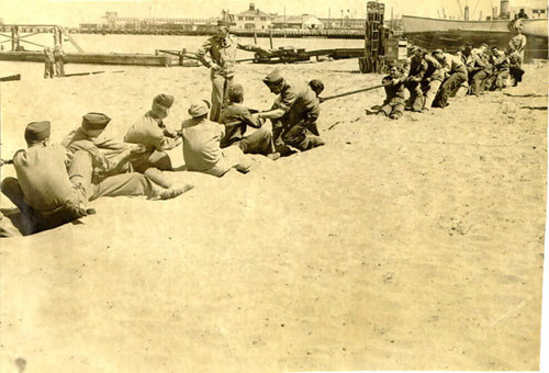 [Group of soldiers having a tug-of-war at Crissy Field]