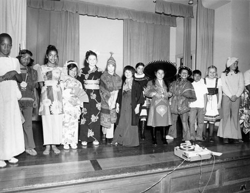 [Students at John W. Geary School dressed in costumes for an International Celebration]