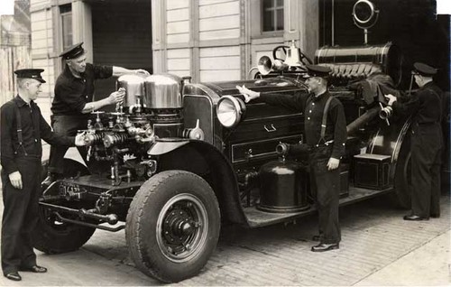 [Firemen cleaning fire engine at Old Engine 10 on 17th and Folsom Street]