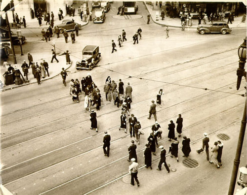 [Pedestrians crossing Market Street]