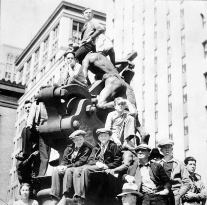 [Group of children sitting on the Donahue Monument, also known as the Mechanics Monument, on Market Street]