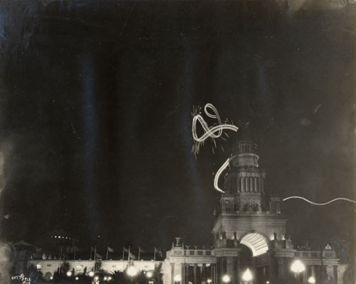 [Art Smith flying by night around the Tower of Jewels]