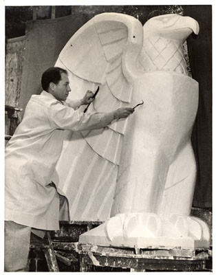 [Sculptor Jacques Schnier working on a plaster eagle, statue will be located in the Court of Flowers, Golden Gate International Exposition on Treasure Island]