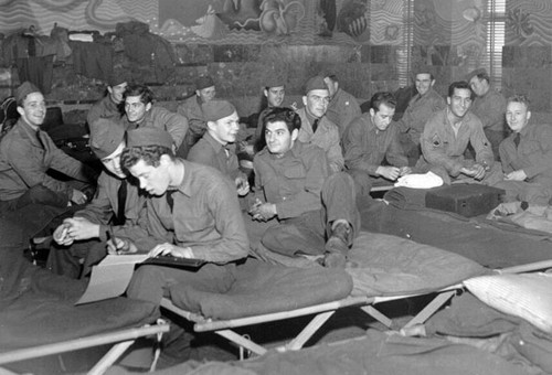 [Troops of Battery B, 216th Coast Artillery from Camp Haan take over the highly decorative Aquatic Park casino for a barracks during their tour of duty in the Bay Area]