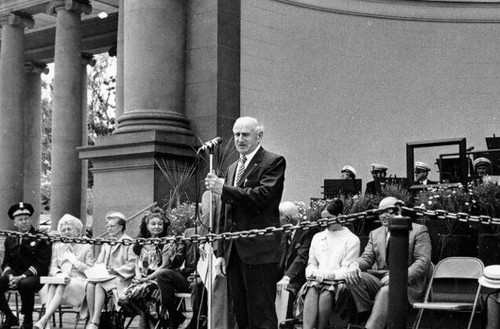 [Speaker on stage at the bandshell during Earthquake Day in Golden Gate Park]