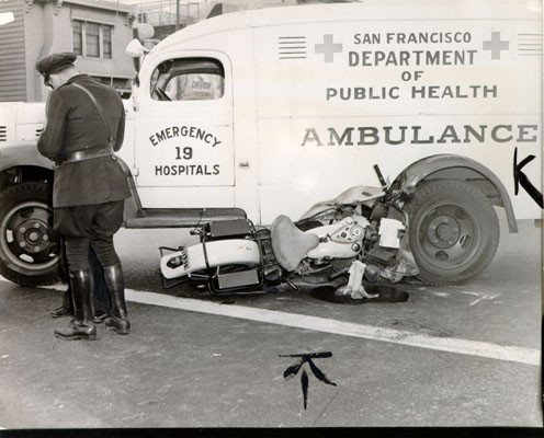 [Department of Public Health ambulance at the scene of a motorcycle accident]