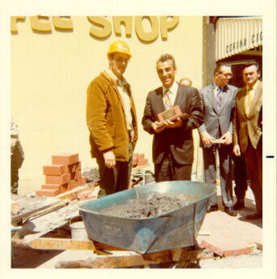 [Ron Bredhoft, Myron Tatarian, William Reedy and Pat Canavan standing together on Market Street]