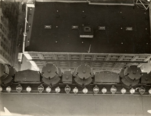 [View looking straight down toward ground from top of Pacific Telephone & Telegraph Company building]