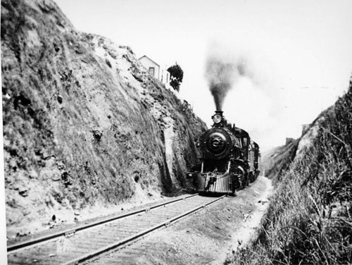 [Railroad train passing through the Bernal Cut]