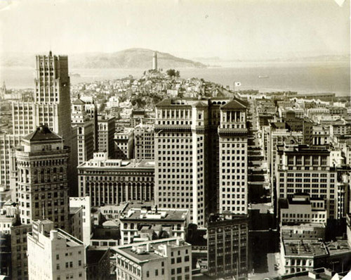 [View of downtown San Francisco with Telegraph Hill and bay in background]