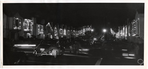 [Houses decorated with Christmas lights on 18th Avenue]