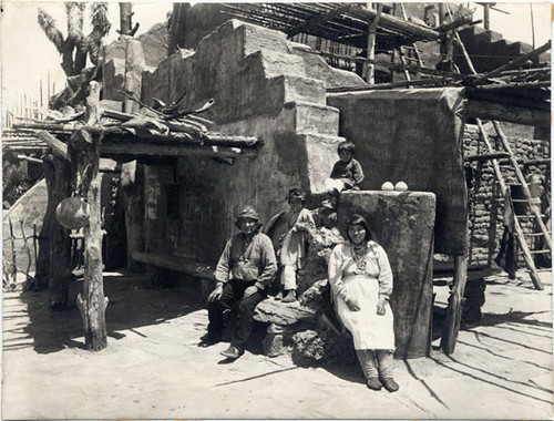 [Hopi family at Pueblo Indian Village in Grand Canyon of Arizona exhibit in The Zone at the Panama-Pacific International Exposition]