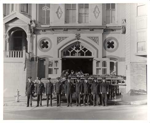 [Group photo of firemen in front of Engine 15 at 2150 California Street]