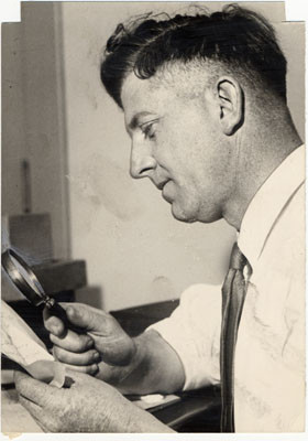 [Police officer Francis X. Latulipe, Jr. looking at a letter.]