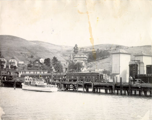 [Alcatraz Island prison train at Tiburon pier preparing to transfer prisoners]