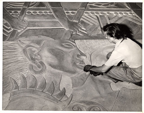 [Artist Esther Bruton working on the mural 'Peacemakers' that will decorate the West walls of the Court of Pacifica, Golden Gate International Exposition on Treasure Island]