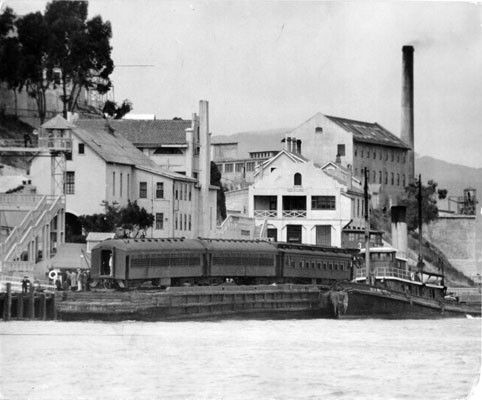 [Alcatraz Island prison train unloading newly arriving prisoners]