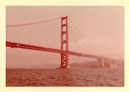 [View of the Golden Gate Bridge taken from a boat in the ocean on the western side of the bridge, looking southeast]