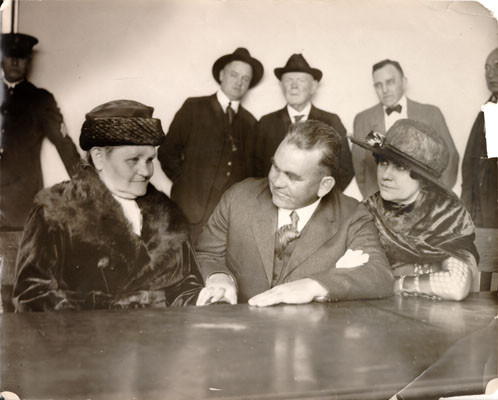 [Thomas J. Mooney with his mother, Mary, and wife, Rena]