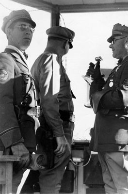 [Highway patrol private J. C. Wallace, Lieutenant Varni and Sergeant R. Hewett in Bay Bridge control station]