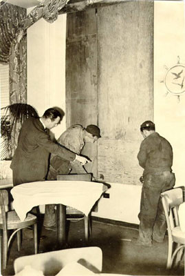 [Workmen reparing a window at the Cliff House]