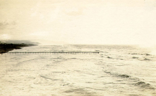 [Pier extending into the Ocean]