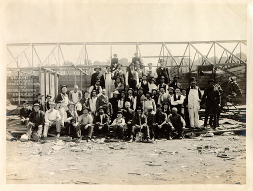 [Volunteer workers tearing down the dolores mission "barricks"]