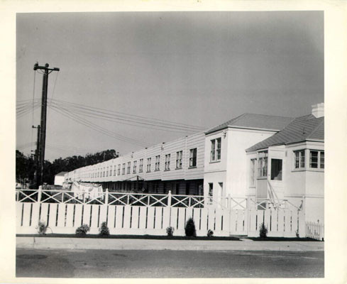 [Back of row of homes in the Sunset District]