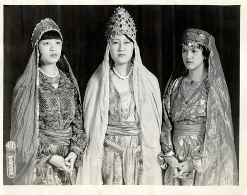 [Lily Lum, Lucy Tom and Mary Chung dressed for their roles in the opera "Queen Esther"]