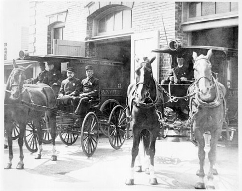 [Horse drawn ambulances in front of Central Emergency Hospital]