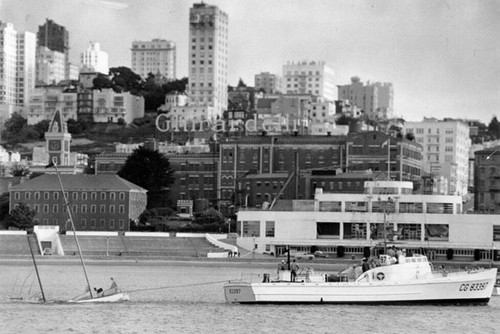 [Coast Guard tows yacht to the Sea Scout base at Aquatic Park]