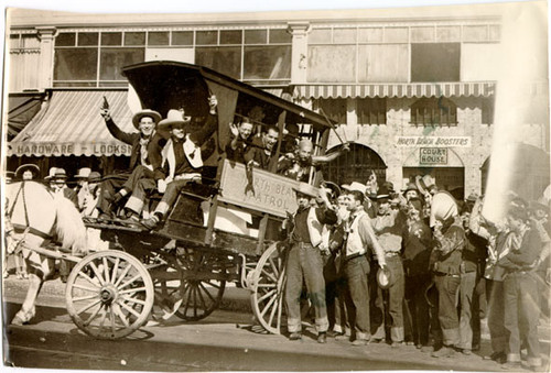 [People dressed in old west costumes during the Golden Gate Bridge Fiesta]