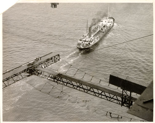 [Oil tanker passing under Golden Gate Bridge]