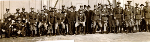 [Highway patrol motorcycle officers pose on Bay Bridge]