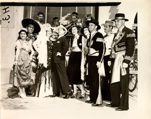 [George Jessell and dancers at the Golden Gate Bridge Fiesta]