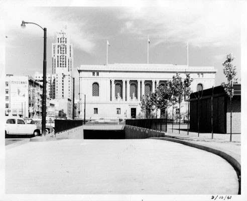 [Entrance to a parking lot located in the Civic Center Plaza]