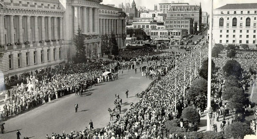 [Large crowd of people gathering in front of City Hall in the Civic Center]