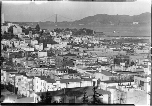 [View of San Francisco, looking west, with Golden Gate Bridge in background]