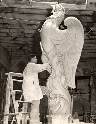 [Artist O. C. Malmquist working on a clay model for statue 'Phoenix' to be place atop the Tower of the Sun, Golden Gate International Exposition on Treasure Island]