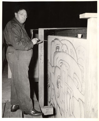 Mexican artist Diego Rivera working on a mural at the Golden Gate