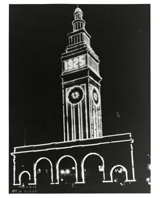 [Ferry Building at night with decorative lighting]