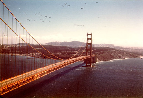 [View of 20 B-29s flying over the Golden Gate Bridge]