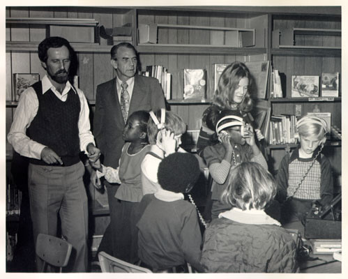 [Students and staff in the New Media Library at Sanchez School]